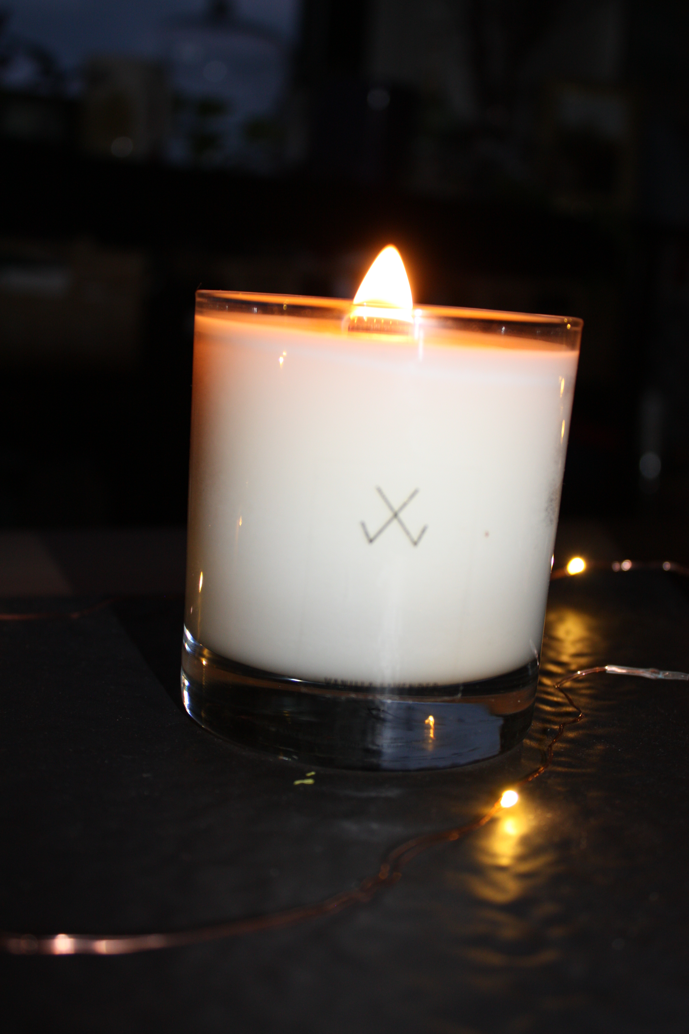 Simply Curated Candles, on my Wellness Tray where the blueboots go